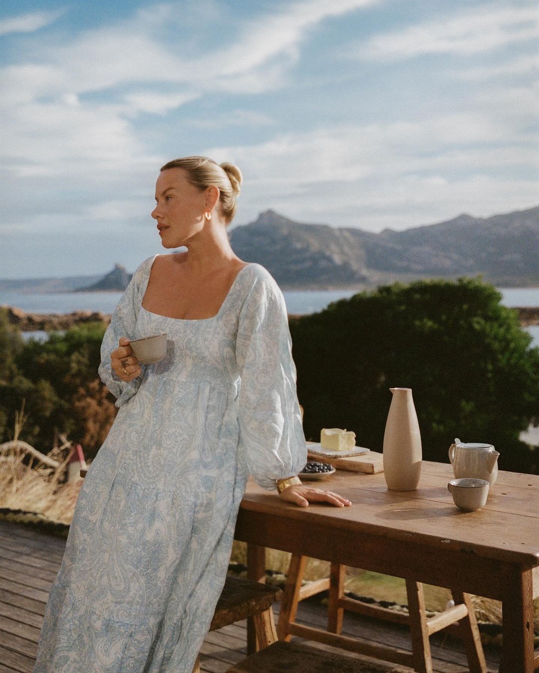 Women wearing a dress on a balcony