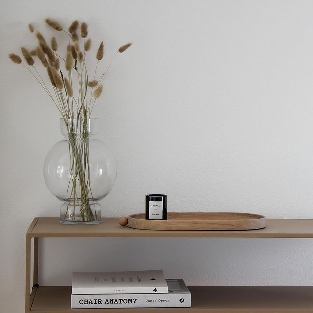 urban apothecary candle next to vase