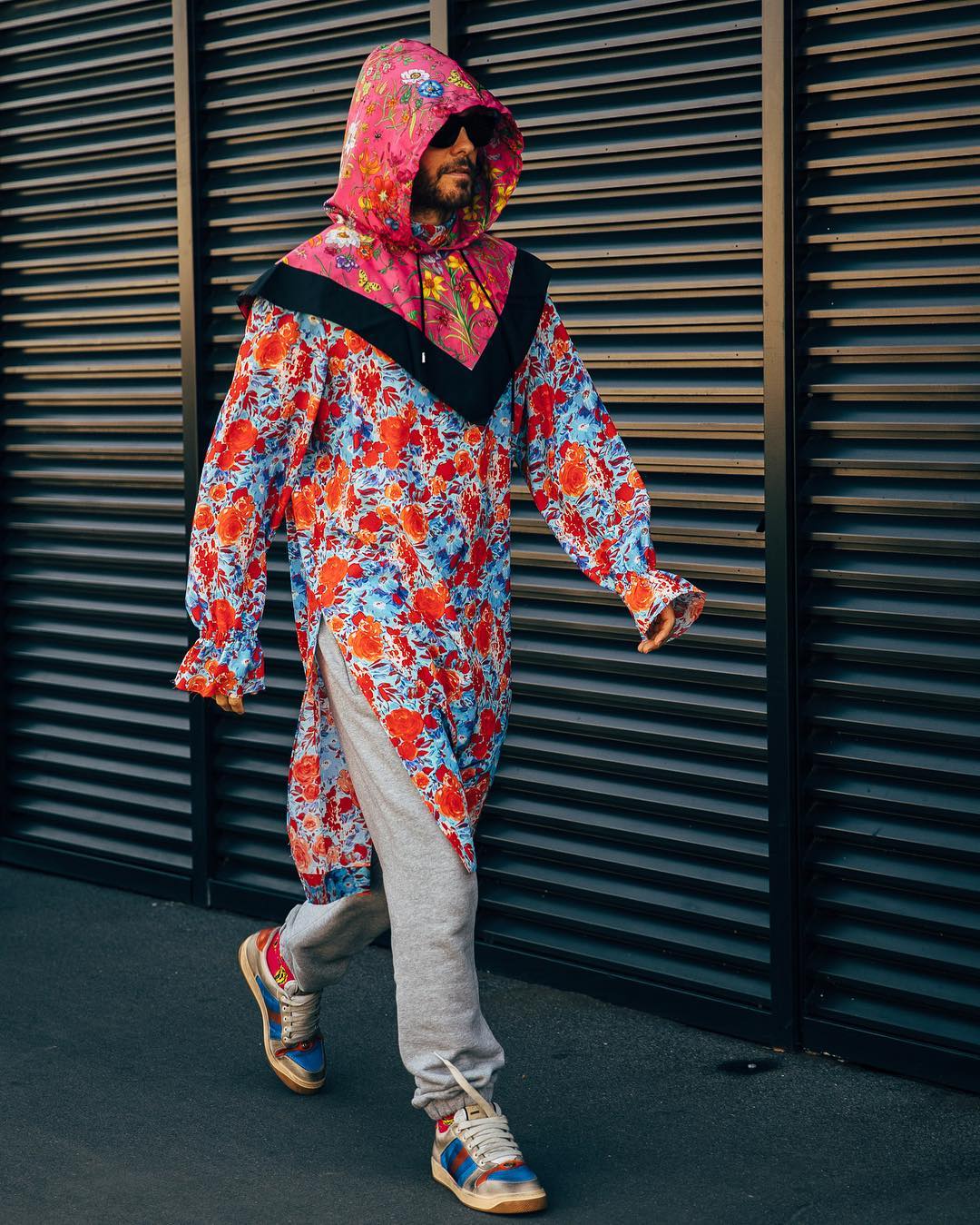 Man walking wearing Gucci