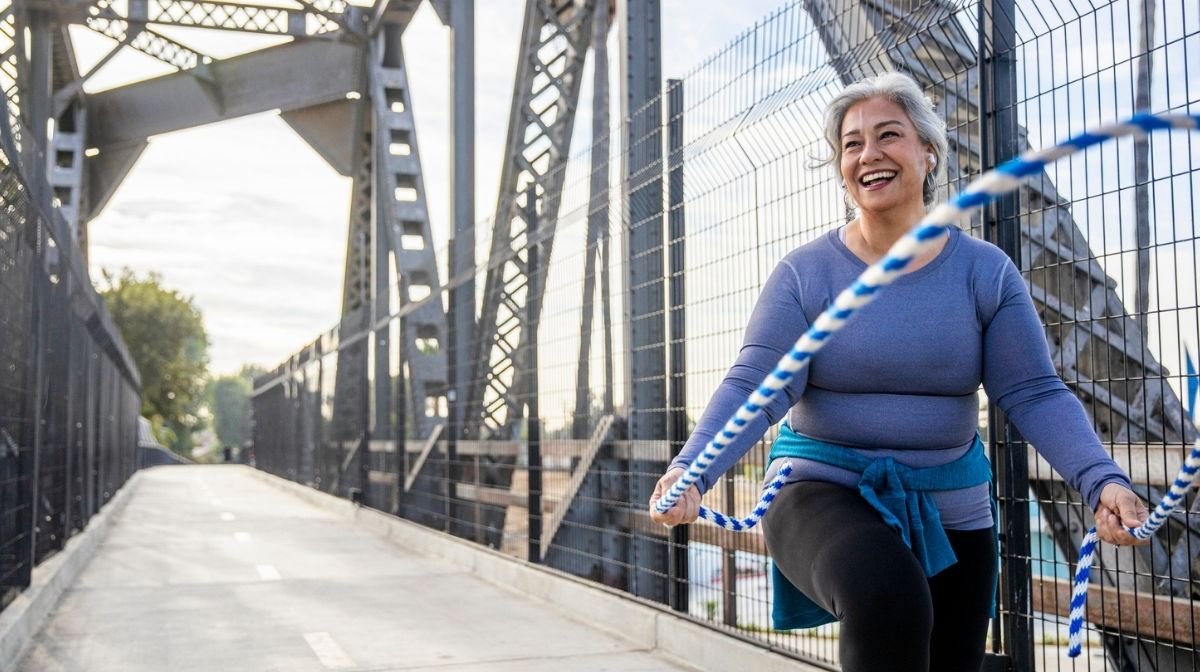 woman exercising with a skipping rope