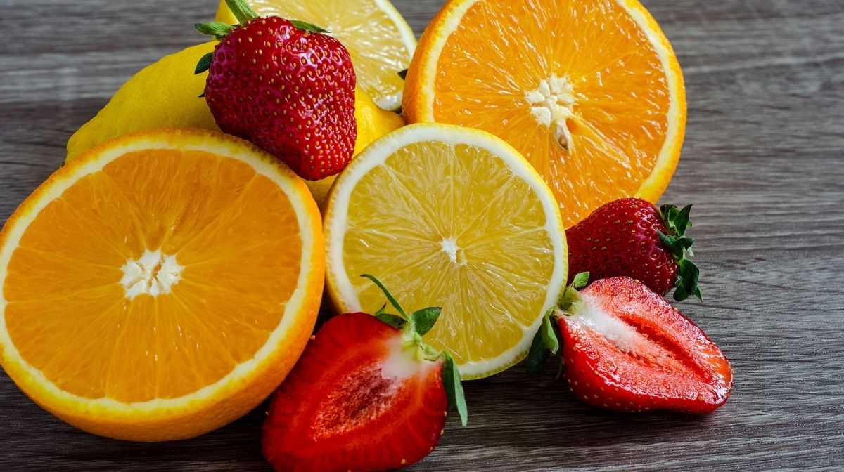 fresh strawberries and oranges