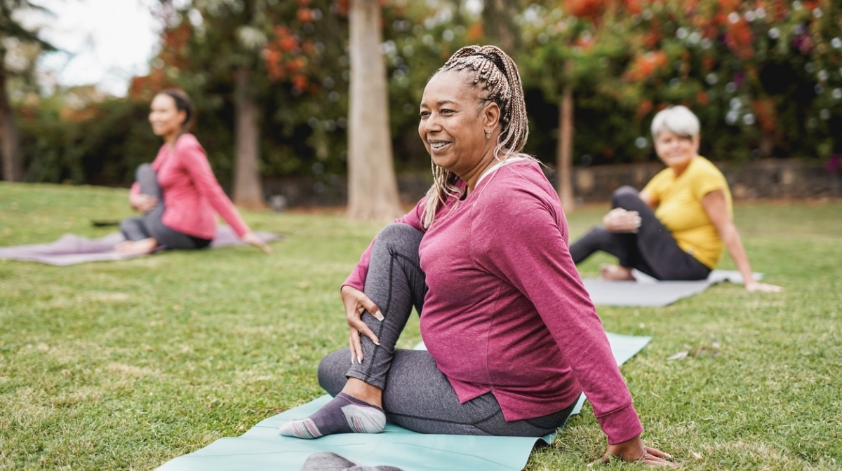 multiracial-women-doing-yoga-exercise