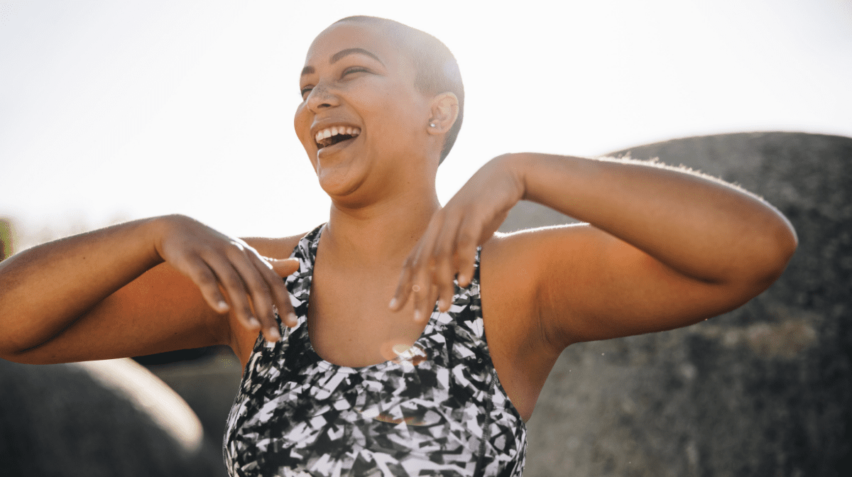 A woman smiling.