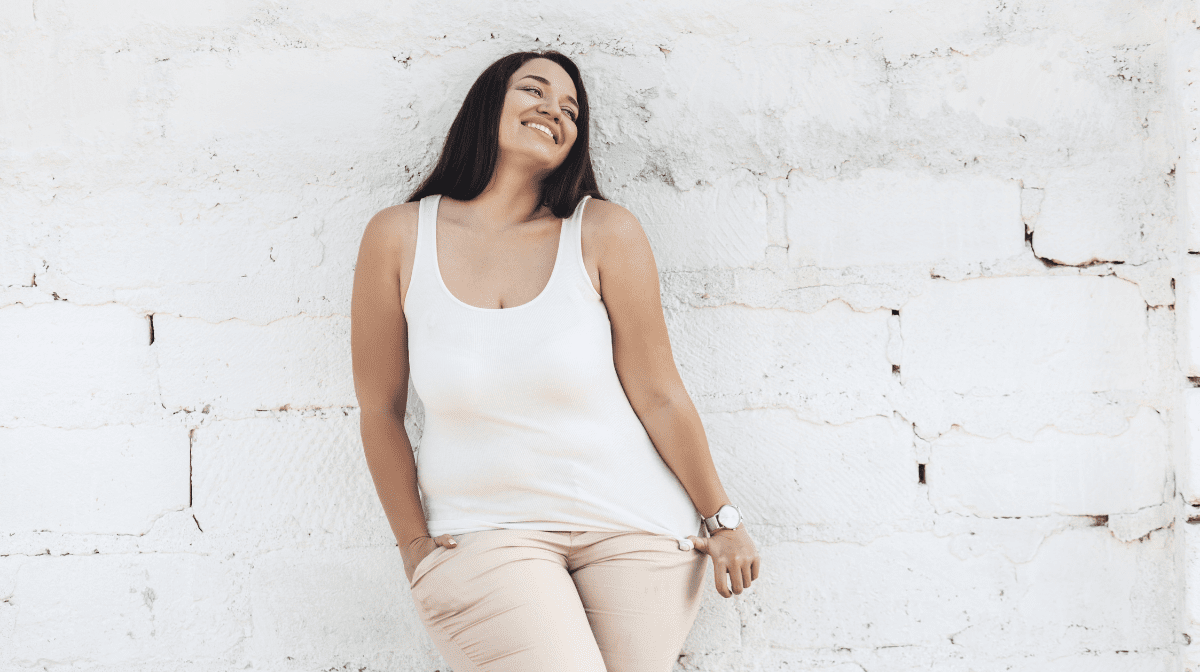 A woman smiling and enjoying the moment. 