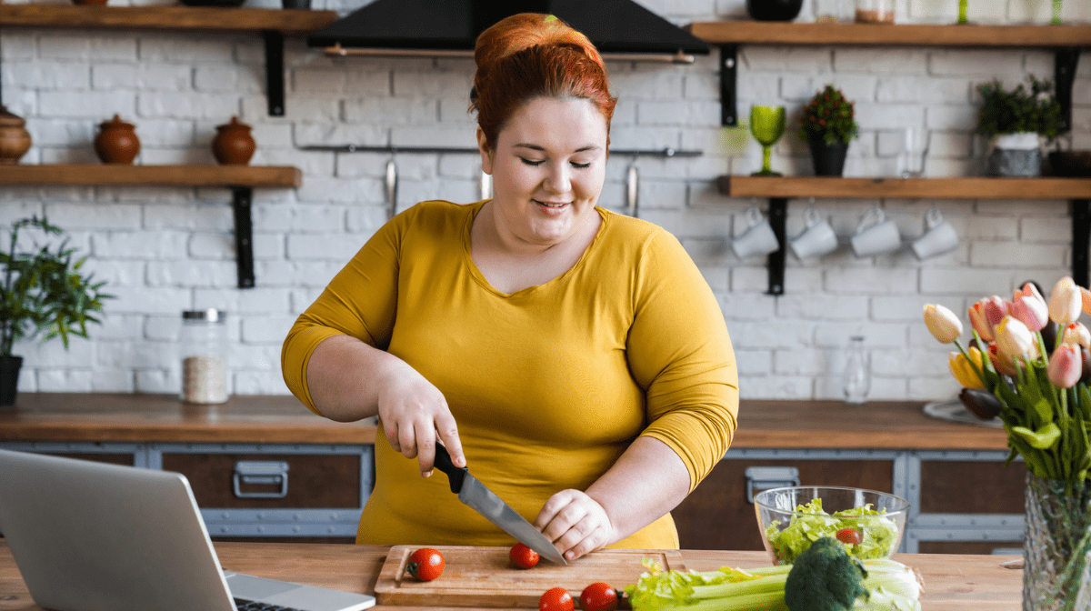 women chopping vegetable