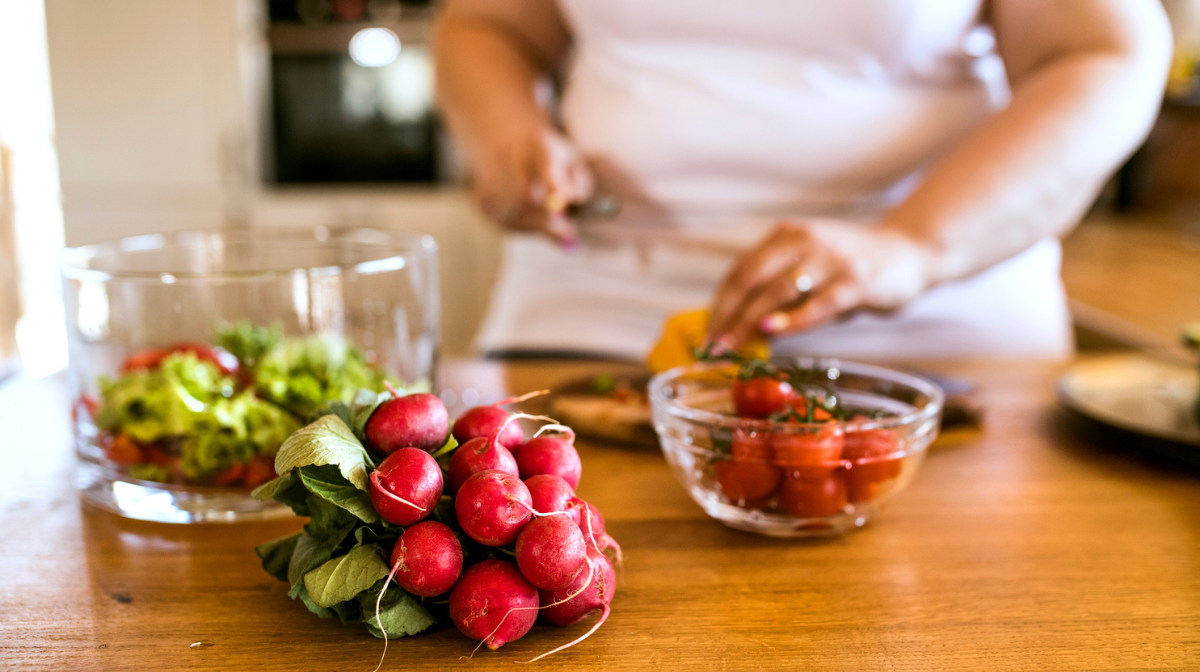 women chopping radish