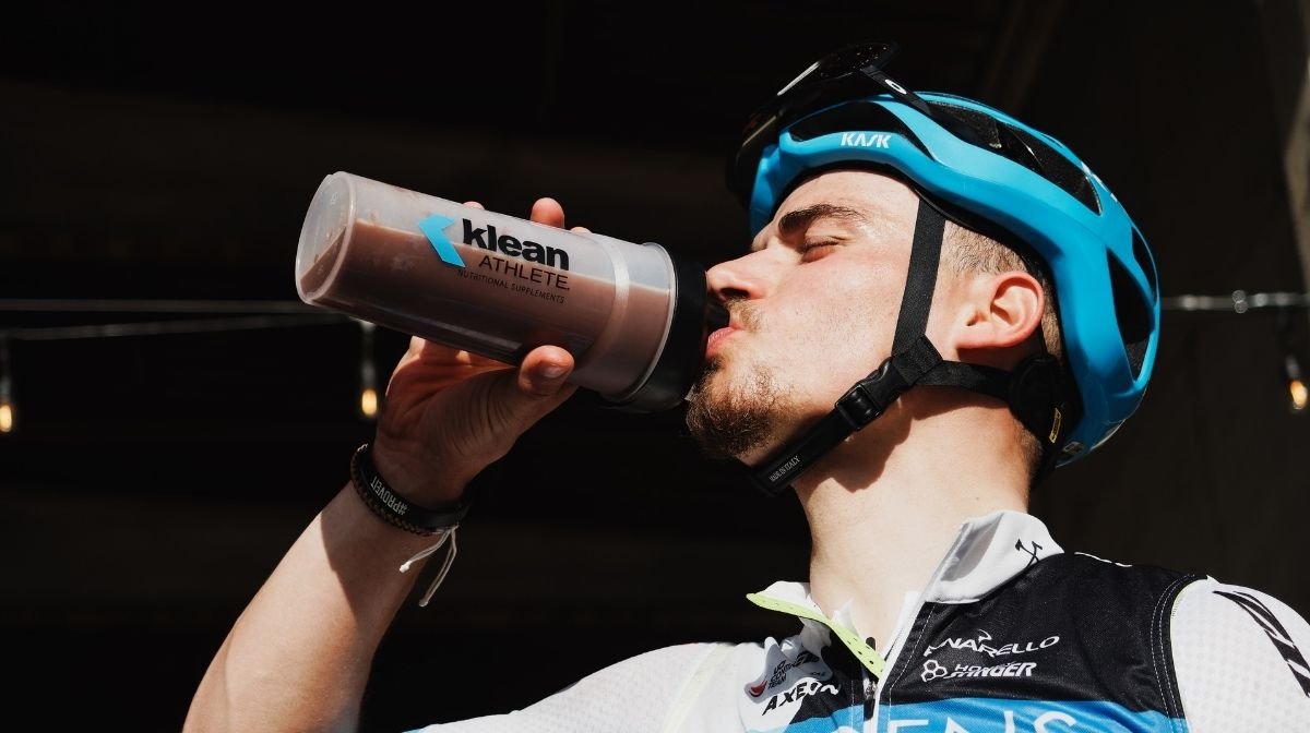 athlete drinking a Klean protein shake