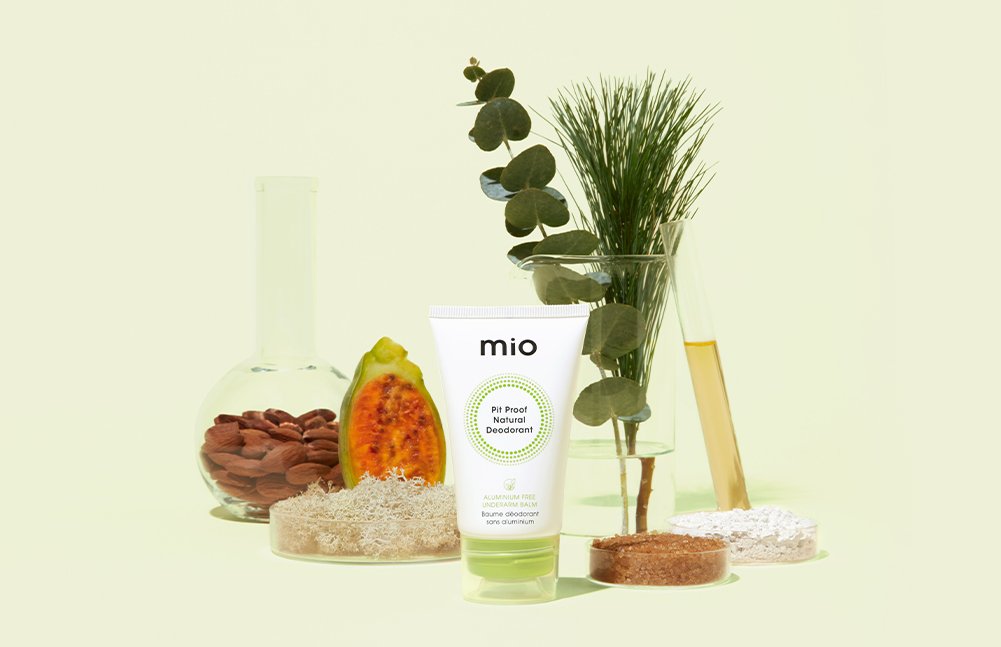 Mio Pit Deodorant with spices and fruits in the background