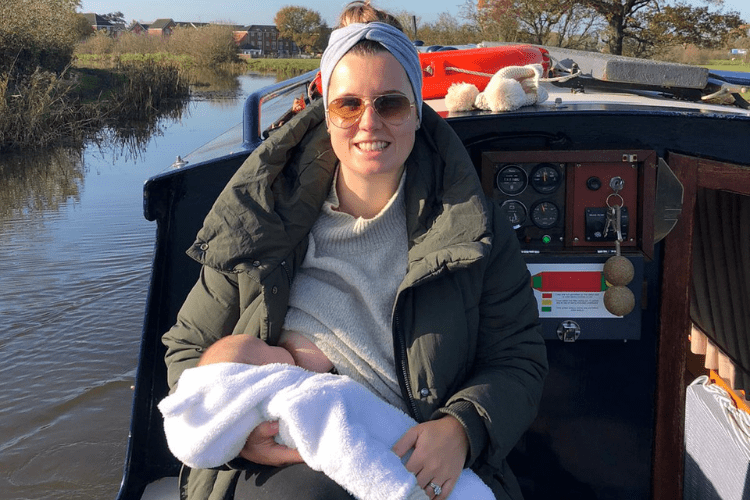 Breastfeeding mum on canal boat