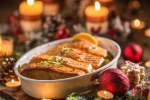 Festive salmon on tray with candles 