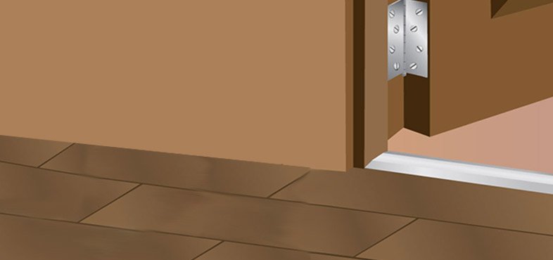 fit a wooden or metal threshold over the edge in all doorways