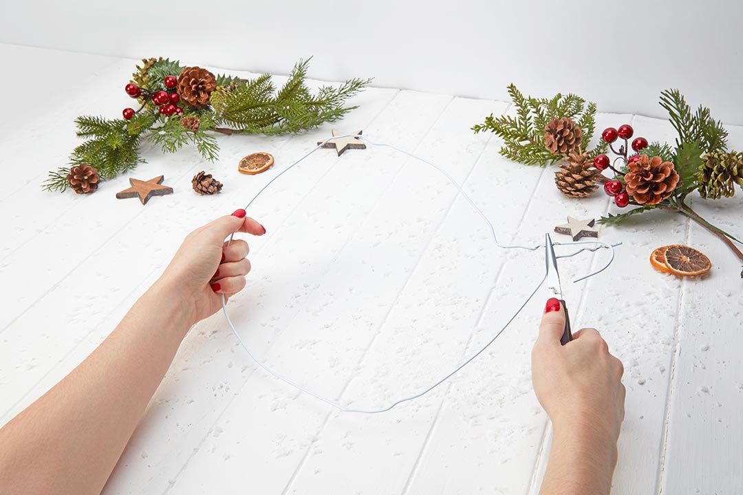 Get crafty and make a wreath from a coat hanger! Preloved UK