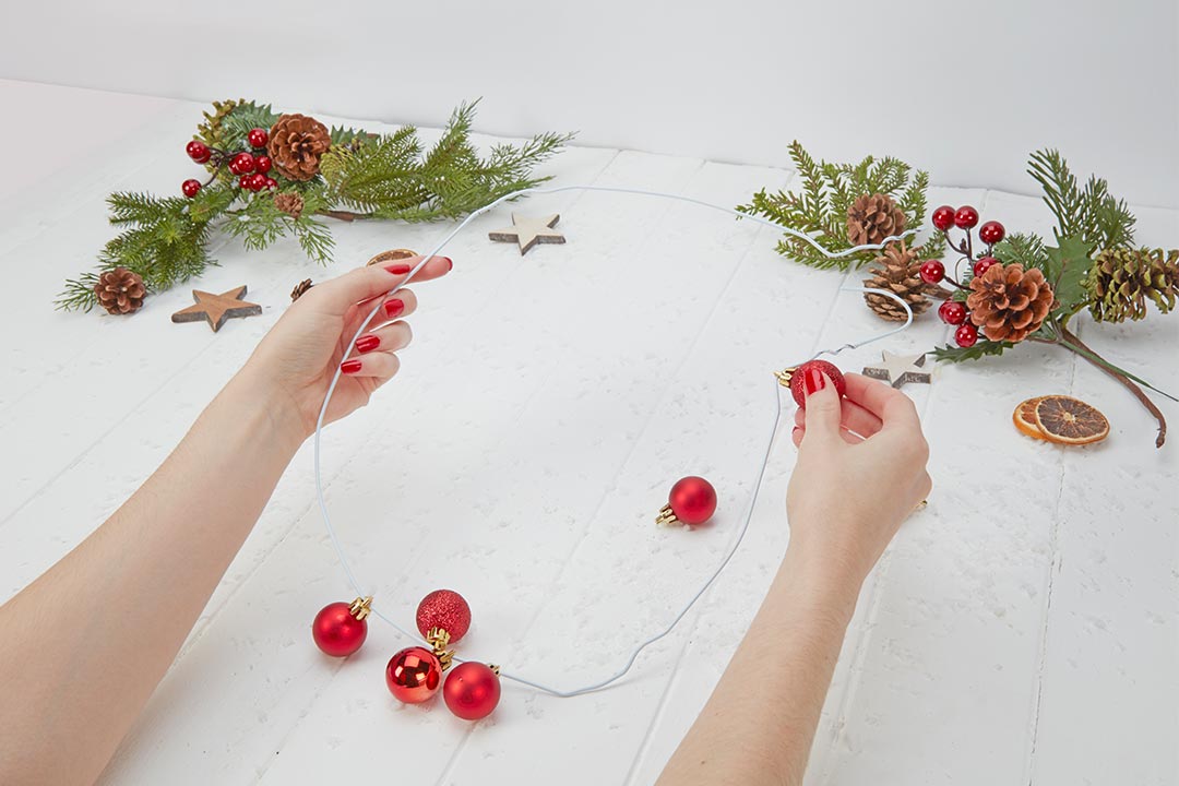Get crafty and make a wreath from a coat hanger! Preloved UK