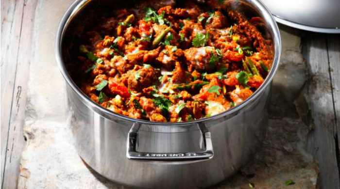 A pot of lamb bhuna curry.