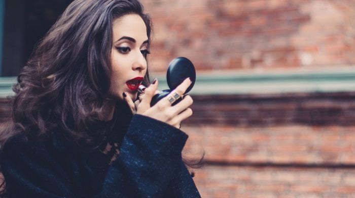 Go dark with your nail polish this festive season (like Meghan Markle)