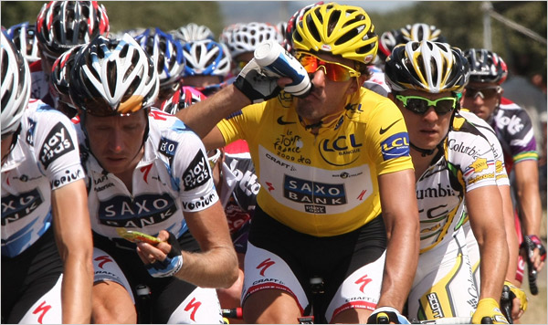 Tour de France yellow jersey cyclist drinking energy drink