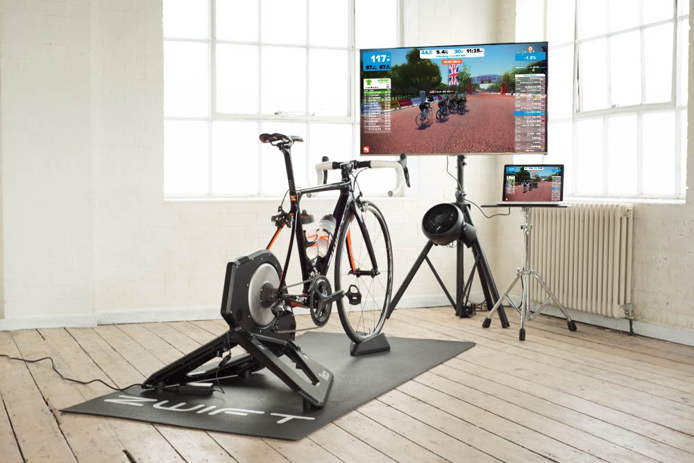 A Tacx Neo turbo trainer setup for Zwift, training on the turbo can be a great way to balance cycling and work.