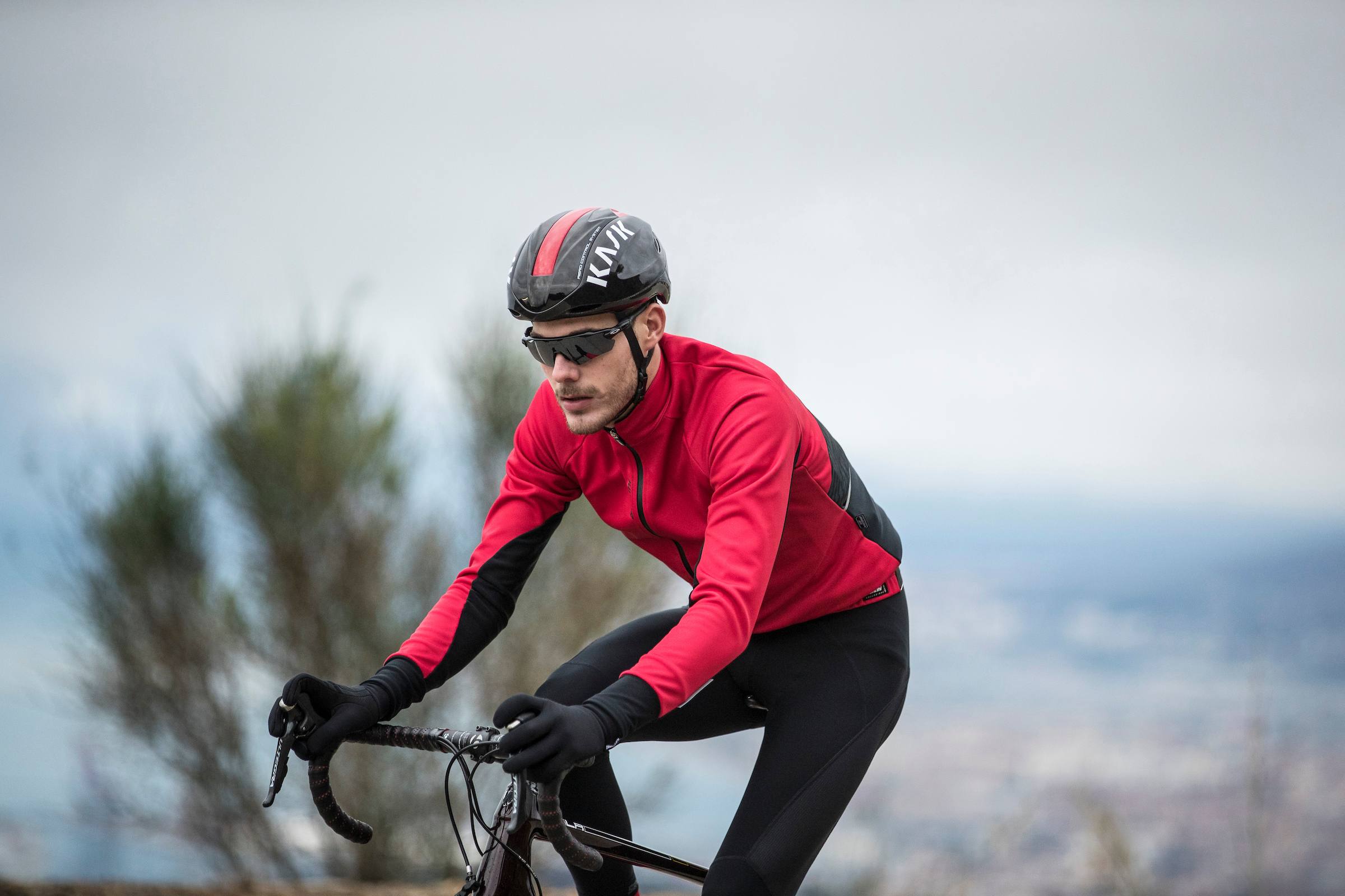 A cyclist wearing the Santini Cycling Beta jacket