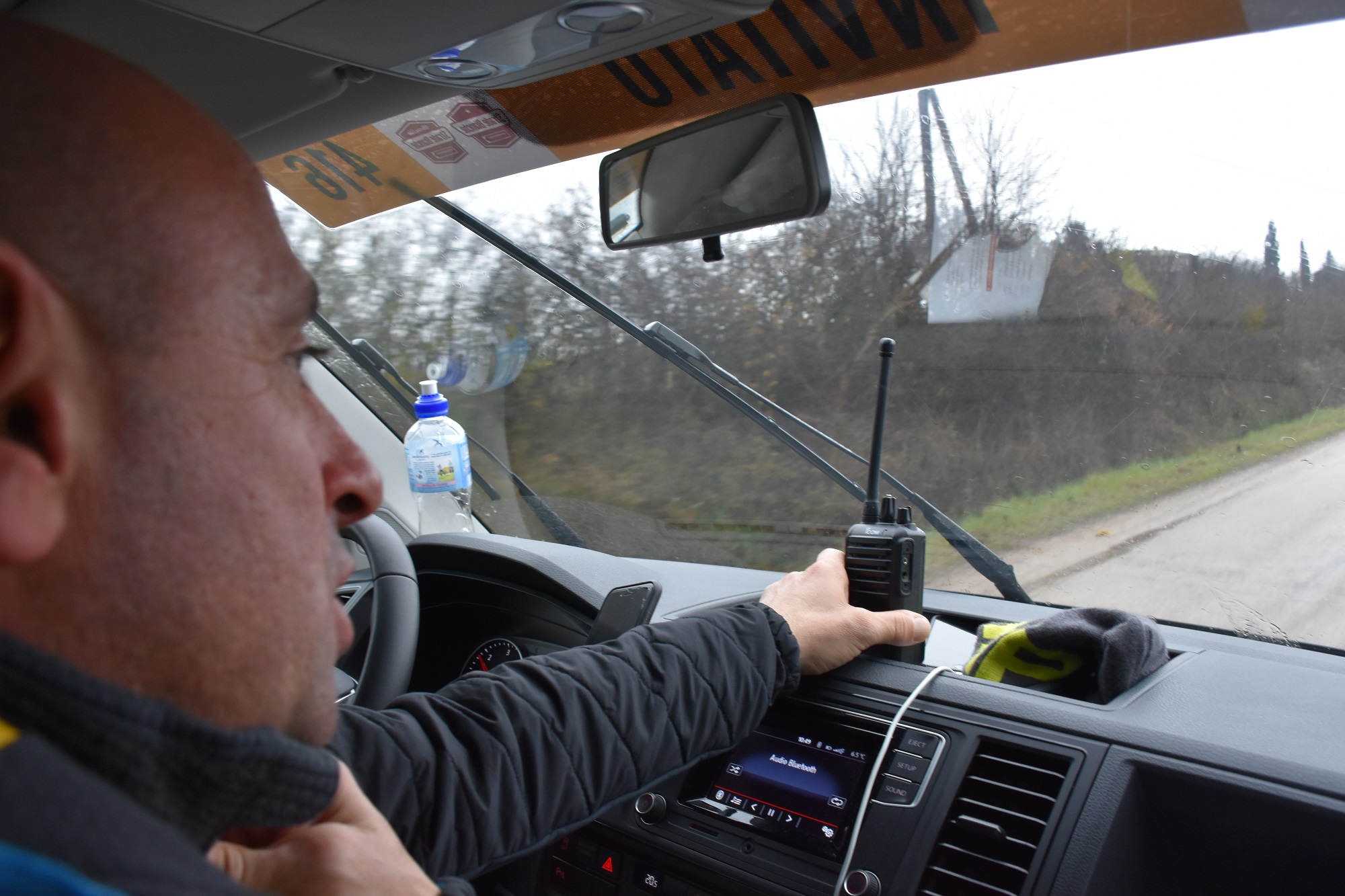 paolo bettini guiding the way in the car