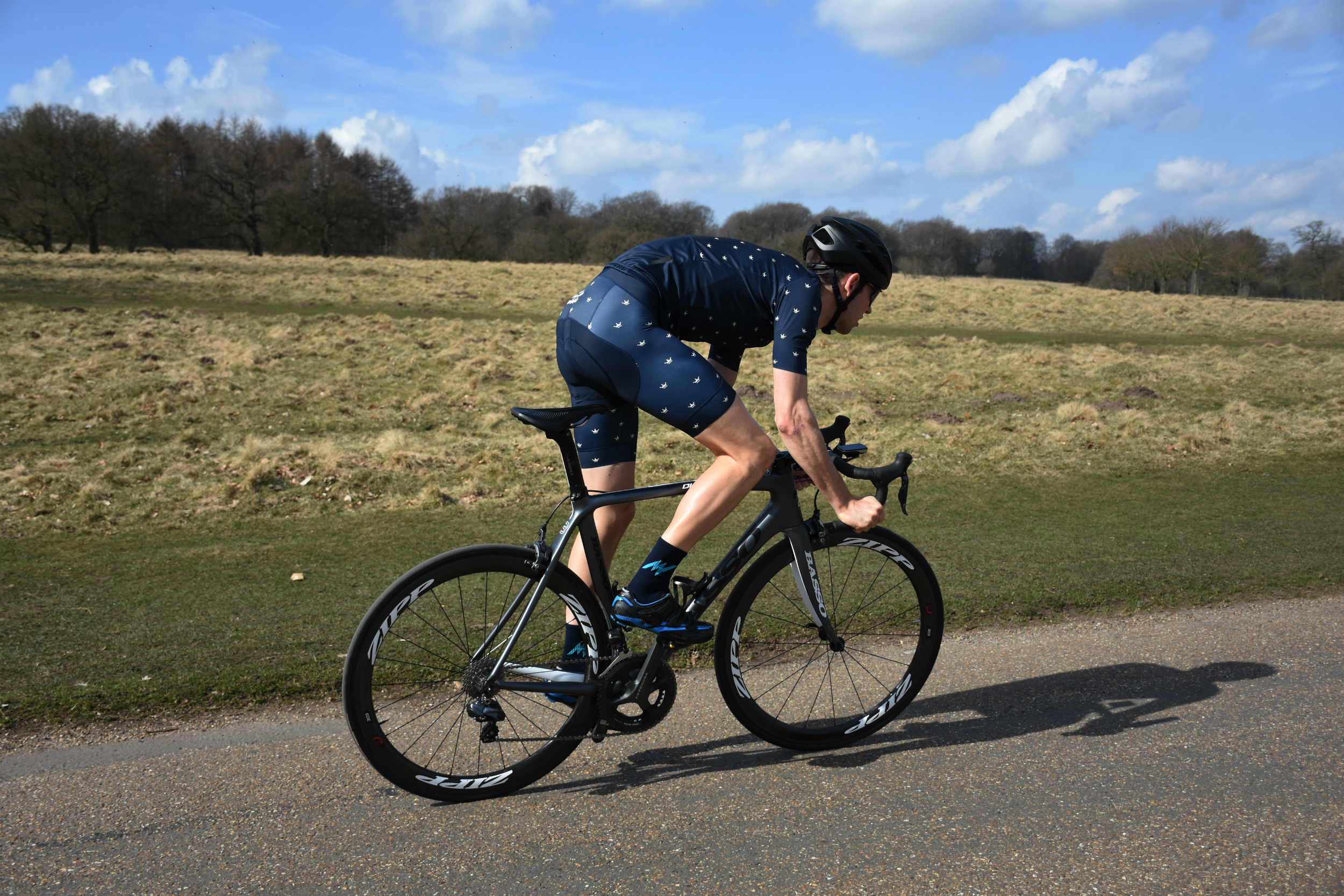 A cyclist sprinting in the morvelo SS18 KOM range