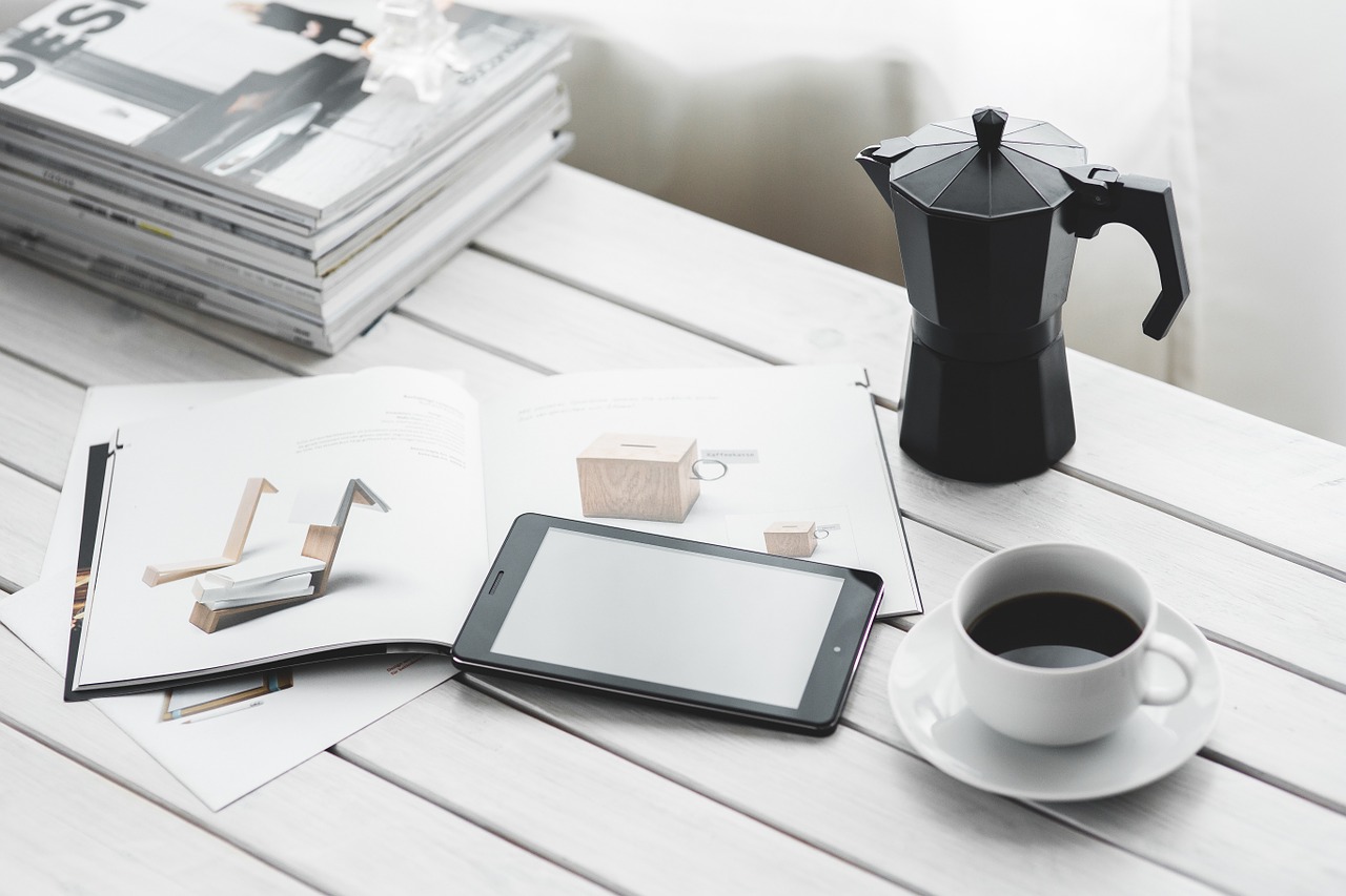 coffee and iPad on desk