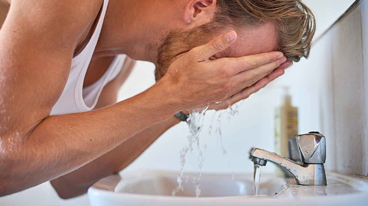 Man Washing Face