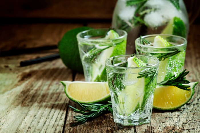 Refreshing drink with rosemary, lime and honey