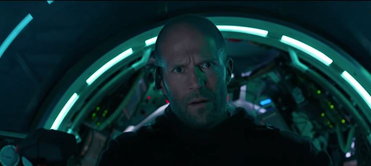 Jason Statham smouldering after saying "it's a megalodon" in our The Meg review