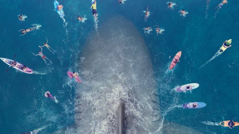 The Meg review. This image shows meg just swimming with some pals nice n happy.