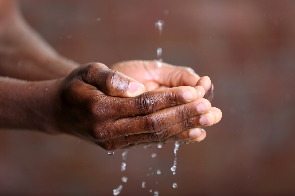 hands with running water-healthy skin