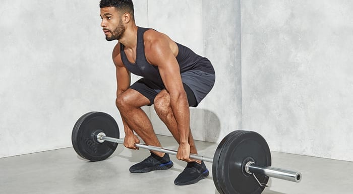 Man in deadlift set-up