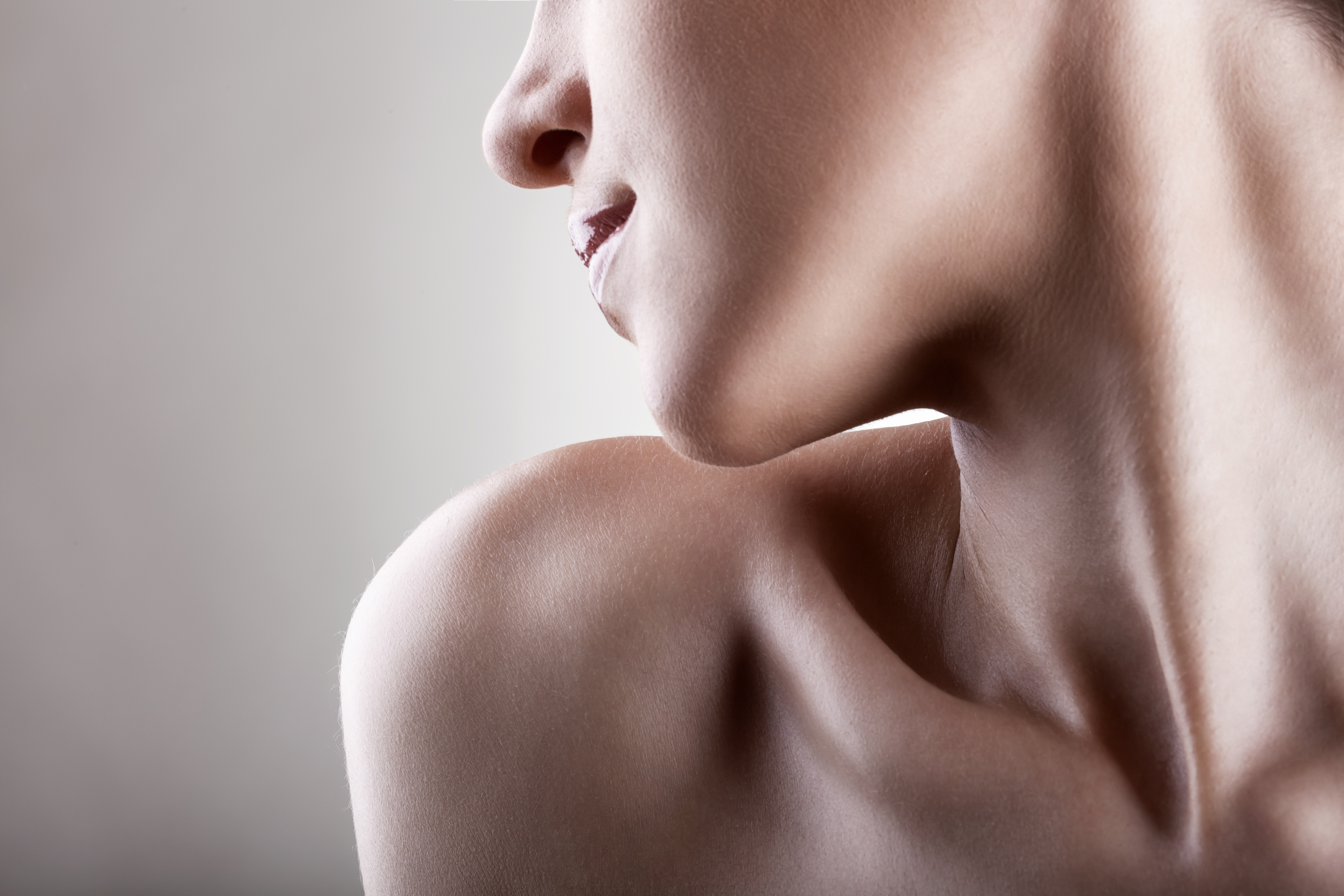 Close-up of a beautiful young woman with a perfectly clean skin