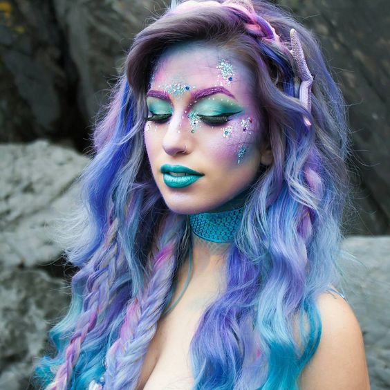 Loose flowy beach waves with braids Halloween hairstyles inspiration