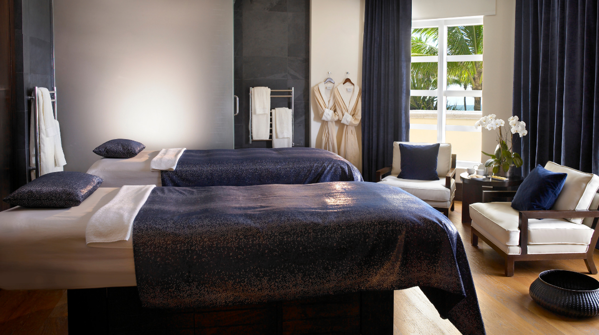 spa beds and dressing gowns in spa treatment room