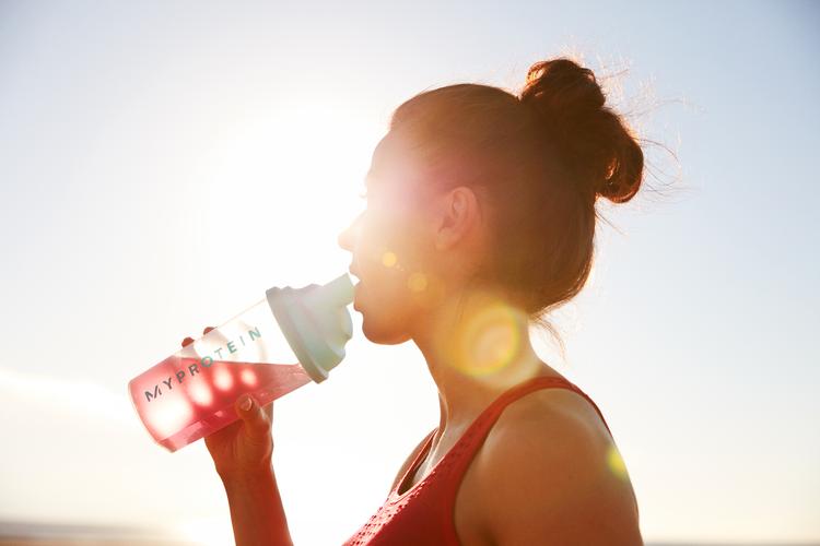 woman drinking bcaas drink