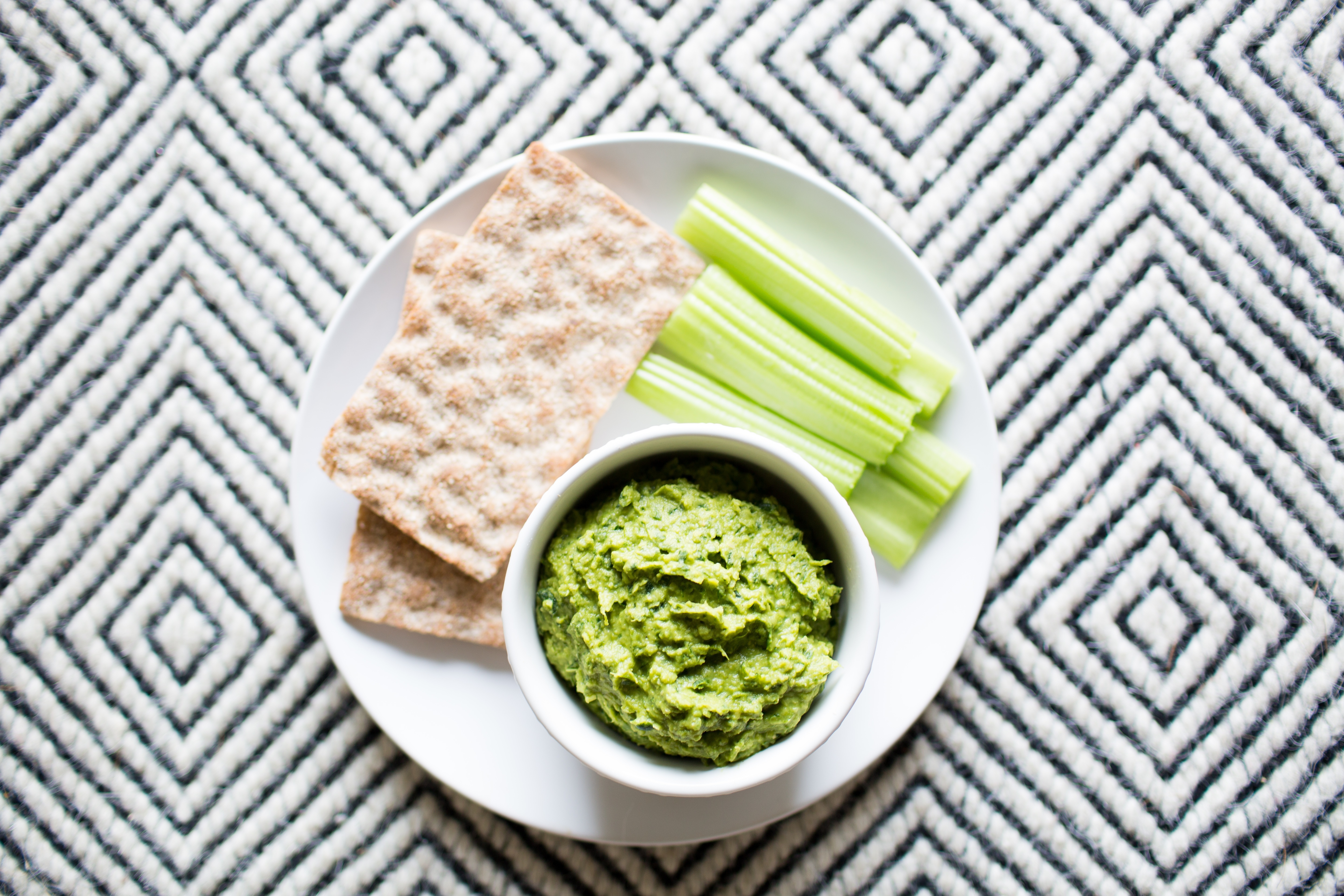 Green Herb Hummus with Celery Sticks and Crackers