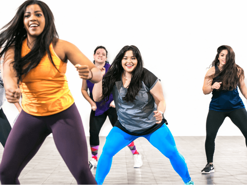 A group of women involved in a zumba class