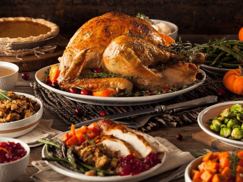Thanksgiving dinner with turkey and all manner of side dishes