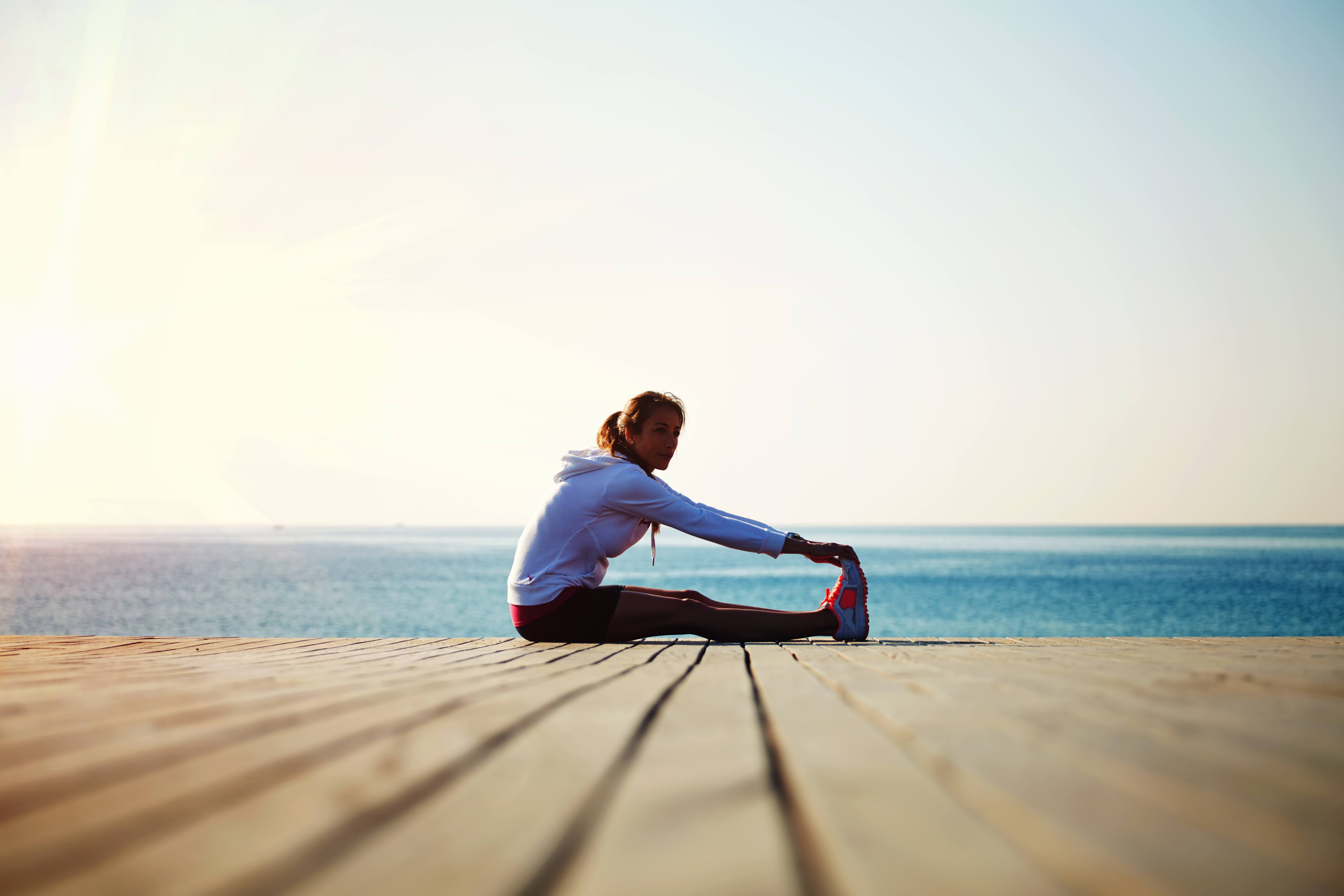 woman stretching outside