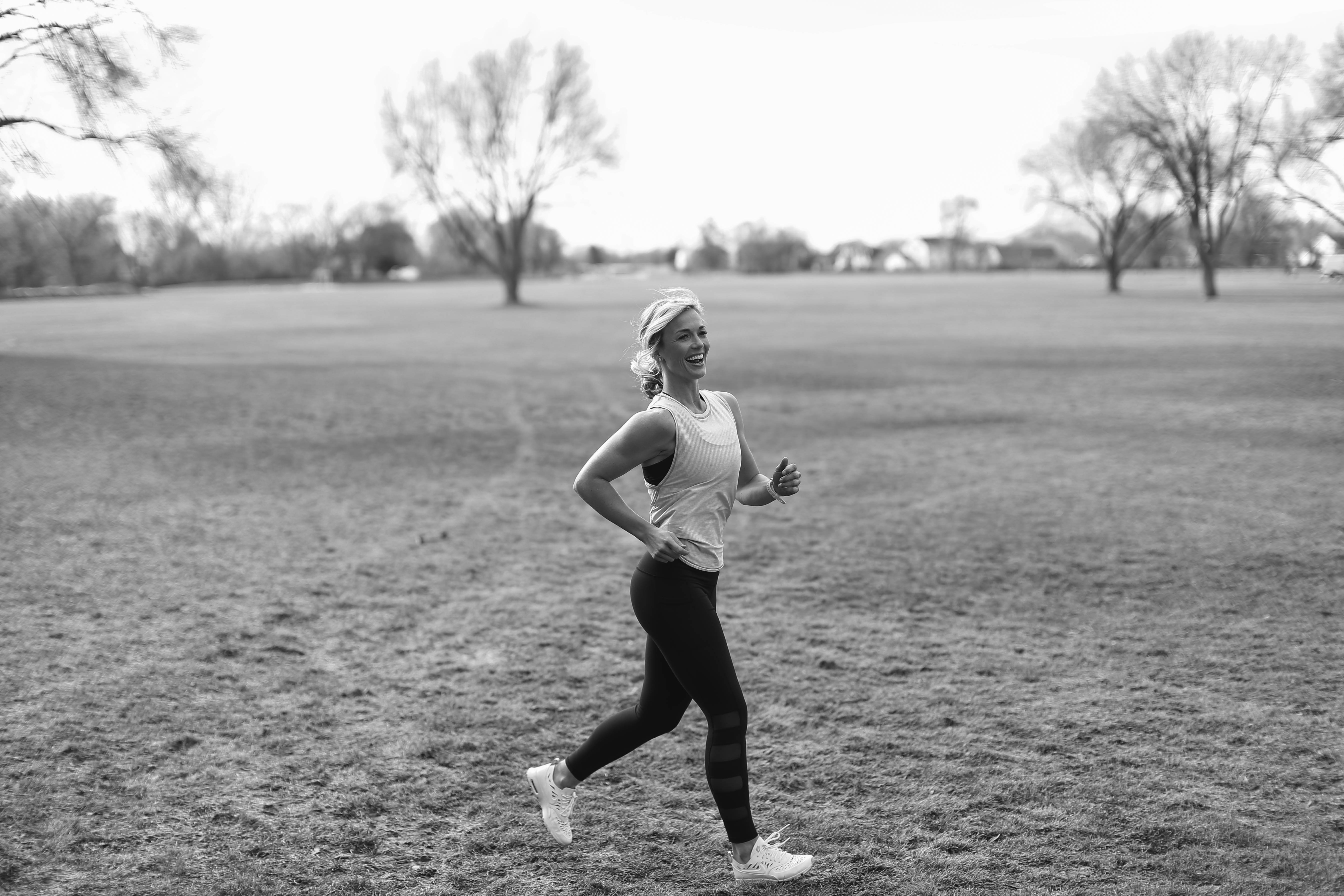 Coach Kristi running outside