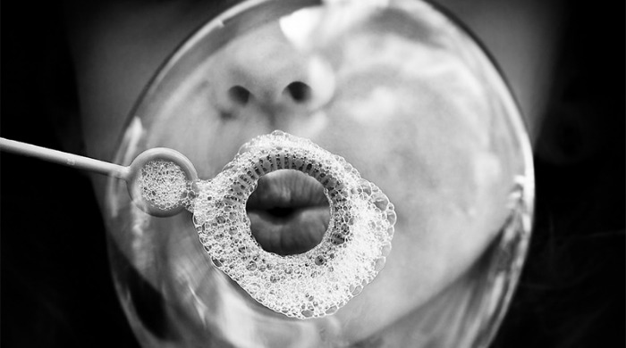 Benoit Courti Photography - a close-up of a bubble being blown.