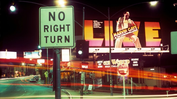 Rock 'n' Roll Billboards of LA's Sunset Strip: A billboard promoting a Marvin Gaye tour next to a street sign saying 'no right turn'.