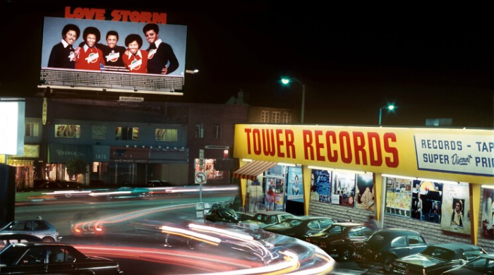 Rock 'n' Roll Billboards of LA's Sunset Strip: A billboard reading 'Love Storm' next to a Tower Records Shop.