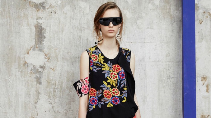 A model wearing a flower patterned MSGM top.