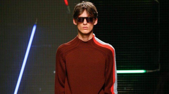 A male model wearing an MSGM jumper.