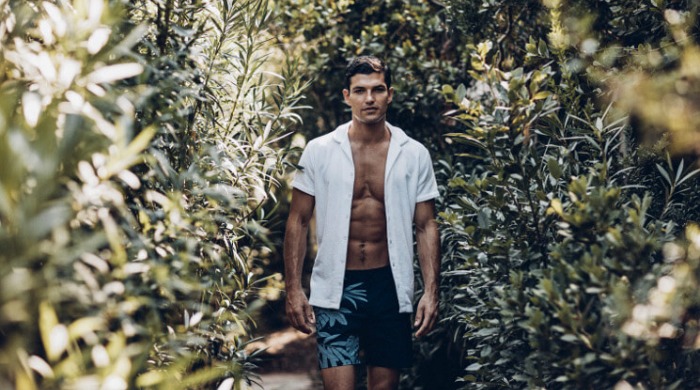 A male model wearing Orlebar Brown clothing.