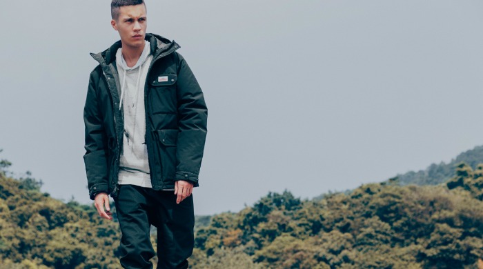 A male model wearing Penfield clothing.