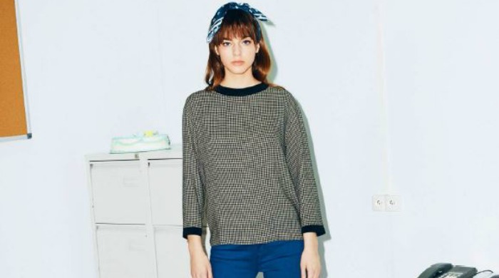 A model wearing Maison Kitsuné clothing.