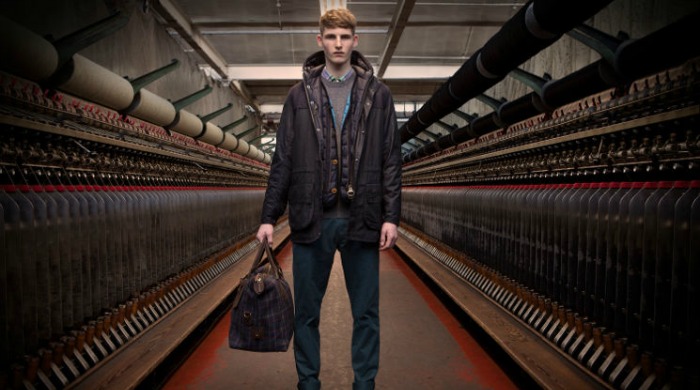 A male model wearing Barbour clothing.