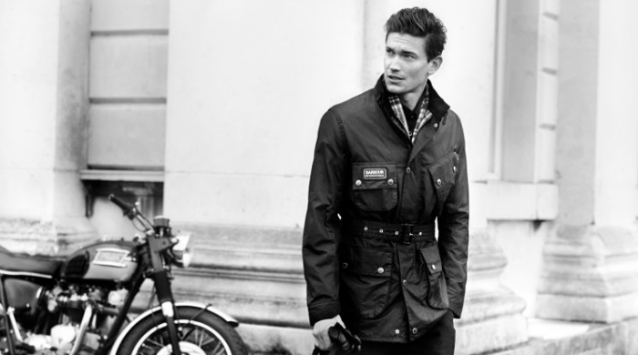 A male model wearing Barbour International clothing.